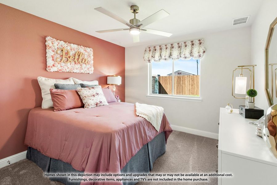 Bedroom with pink accent wall, ceiling fan, carpet flooring, and white dresser with mirror Bedroom with pink accent wall, ceiling fan, carpet flooring, and white dresser with mirror