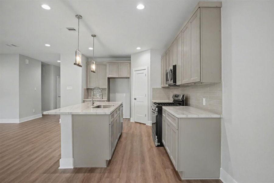 Furnished interior view inside a new home in , Dickinson (Image 8).