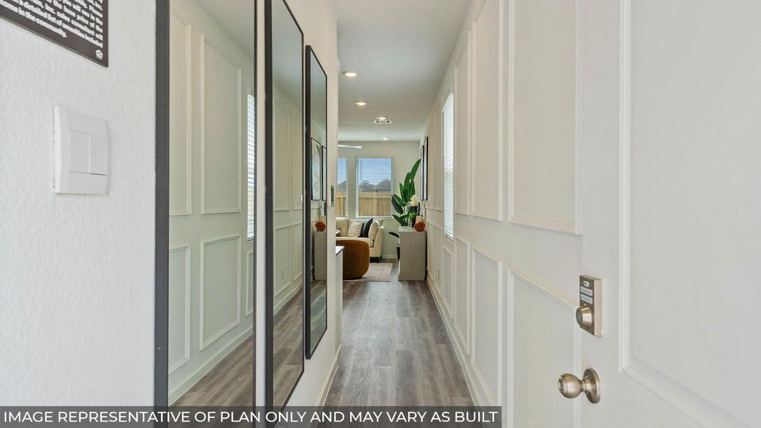 Enter into a bright hallway, leading to a comfortable living area with abundant natural light. Enter into a bright hallway, leading to a comfortable living area with abundant natural light.