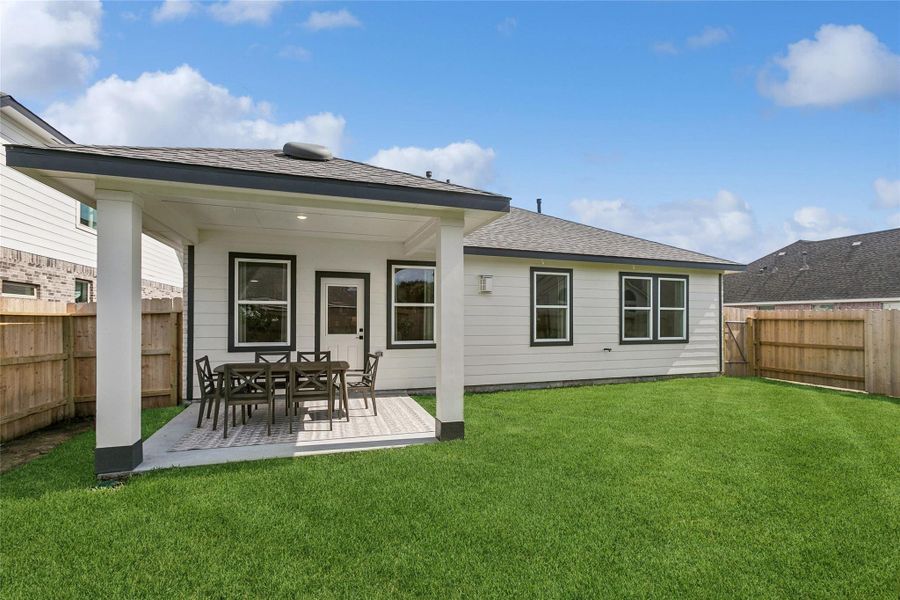Exterior details and patio area of a home in Ascend at Legends Bay, Baytown (Image 3).