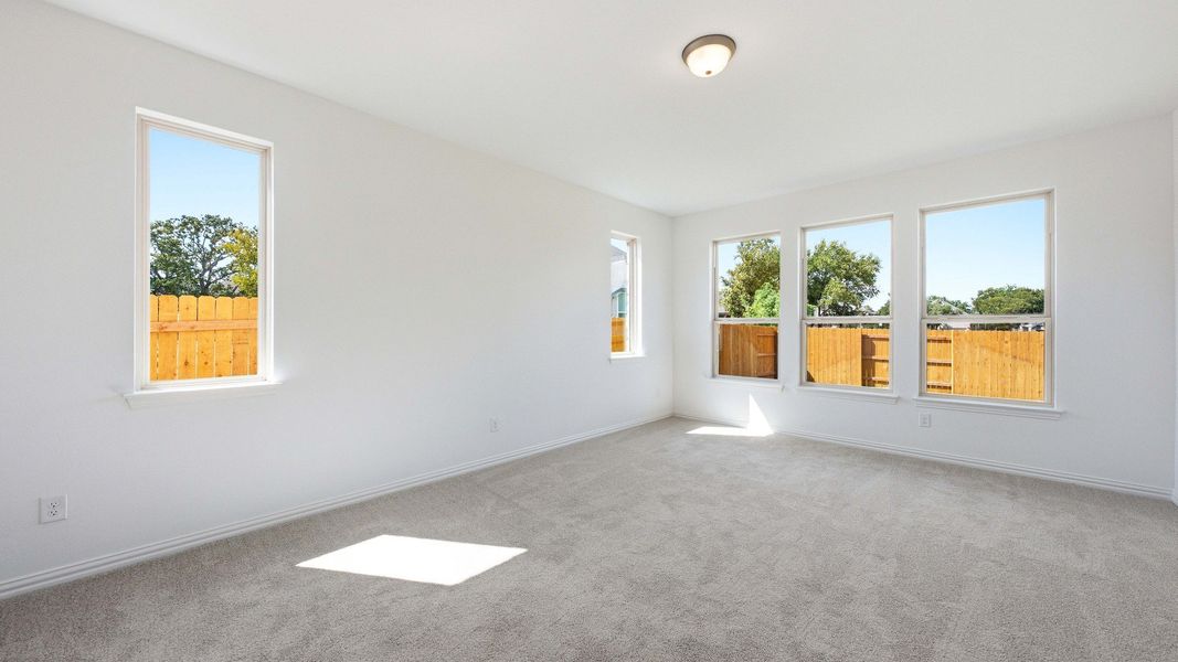Furnished interior view inside a new home in Oaks at San Gabriel, Georgetown (Image 18).