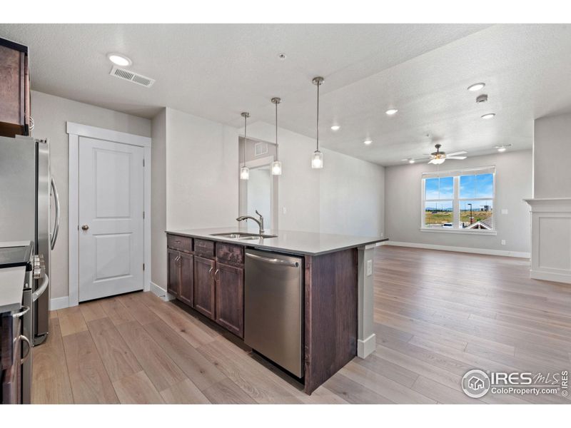 Furnished interior view inside a new home in The Lakes at Centerra - North Shore Flats, Loveland (Image 6).