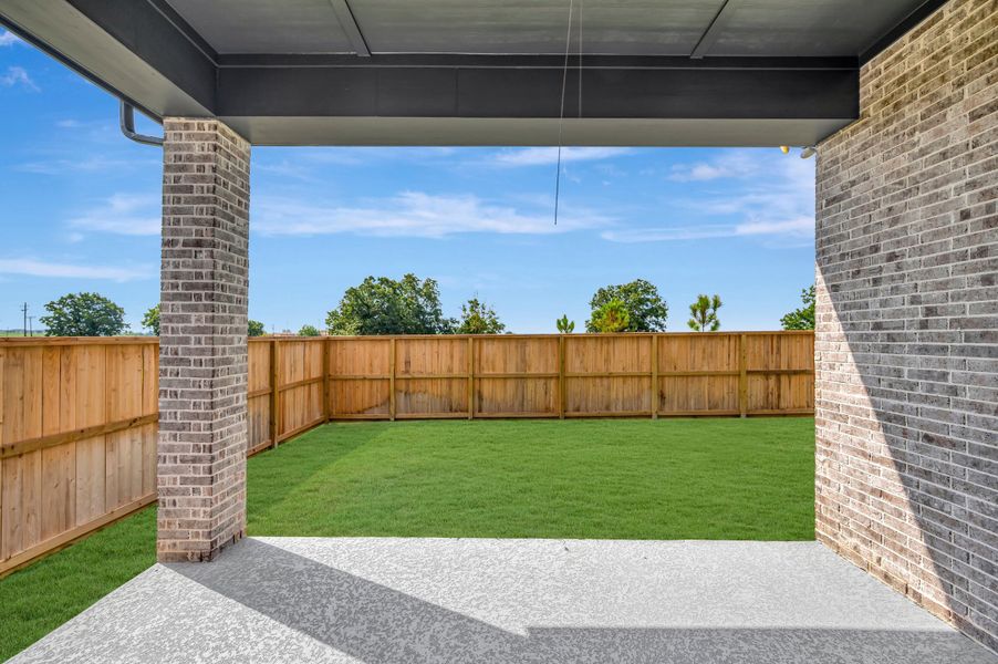 Exterior details and patio area of a home in Harvest Green - Reserve Collection, Richmond (Image 3).
