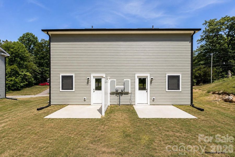 Exterior details and patio area of a home in , Conover (Image 3).