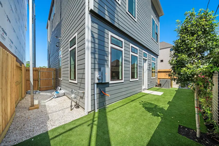 Exterior details and patio area of a home in Spring Valley Creek, Houston (Image 4).