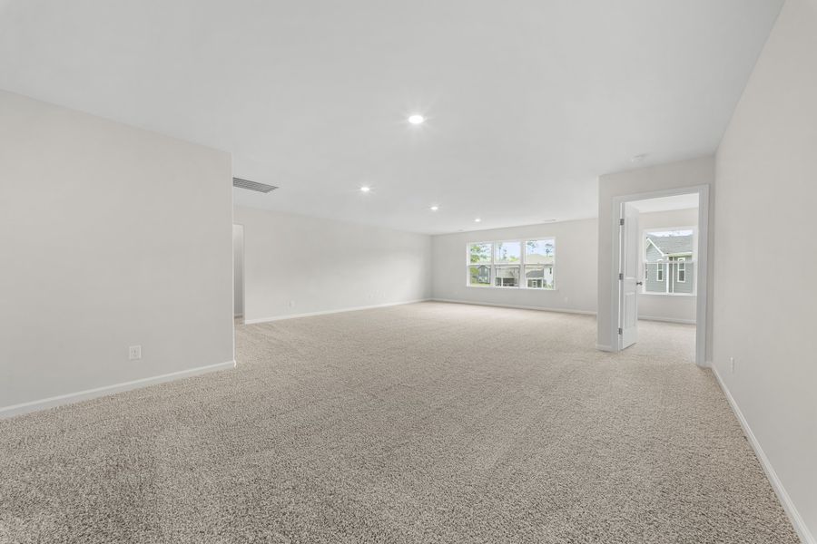 Representative unfurnished interior of a home built from the The Madison by Smith Family Homes in Camden Crossing, Savannah (Image 27).