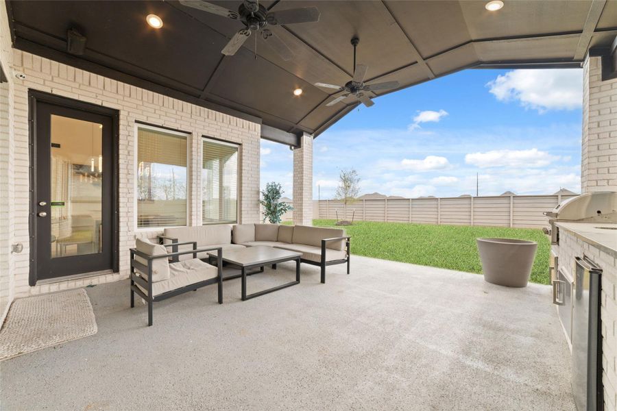 Exterior details and patio area of a home in Pomona 70' - Section 27, Manvel (Image 4).