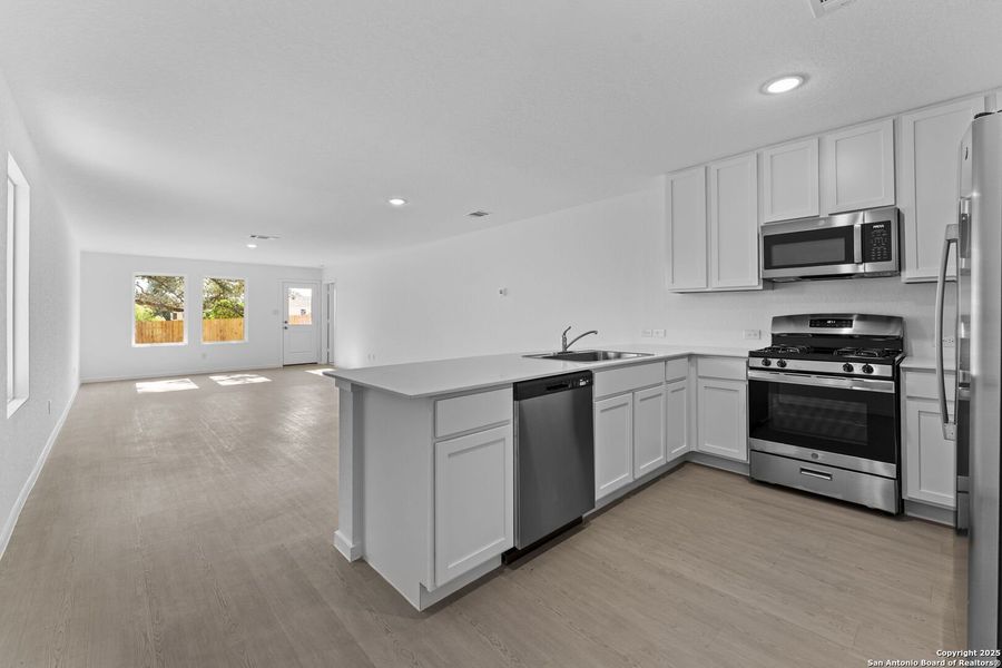 Furnished interior view inside a new home in Waterwheel: Cottage Collection, San Antonio (Image 7).