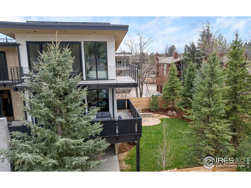 The serene meditation garden, available to all residents, and mature blue spruce trees add natural elements that provide privacy and serenity.