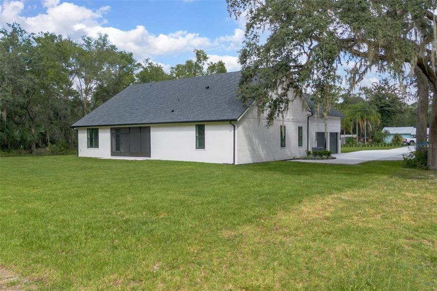 Exterior details and patio area of a home in , Deland (Image 34).