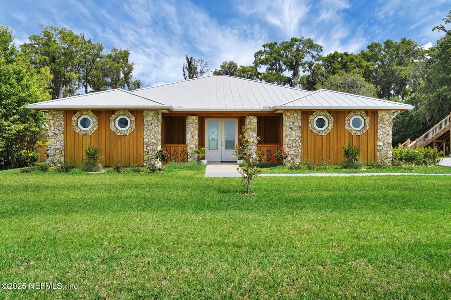 Front exterior of a new home in , East Palatka, FL, highlighting curb appeal (Image 31). Front exterior of a new home in , East Palatka, FL, highlighting curb appeal (Image 31).
