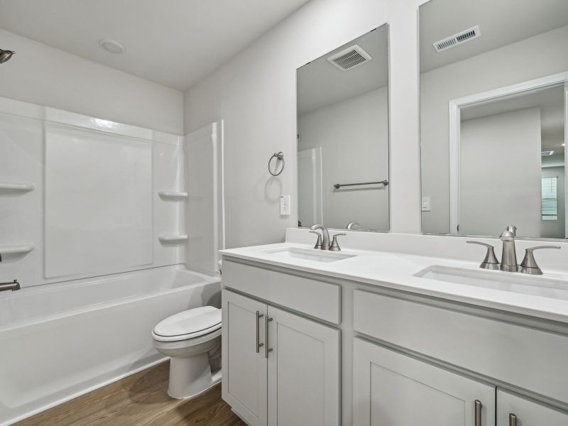 Furnished interior view inside a new home in River Glen, Angier (Image 10).