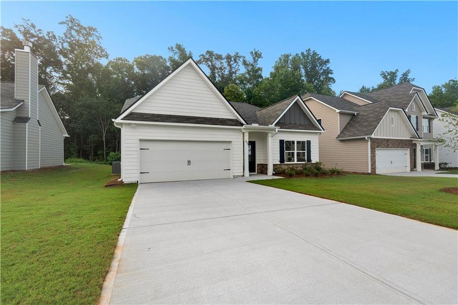 Front exterior of a new home in , Villa Rica, GA, highlighting curb appeal (Image 15).