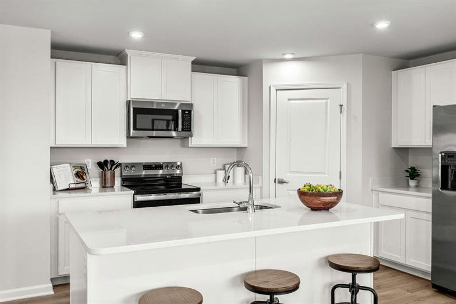 Representative furnished interior of a home built from the Woodford by Ryan Homes in Oakwood Trace, Fairburn (Image 5).