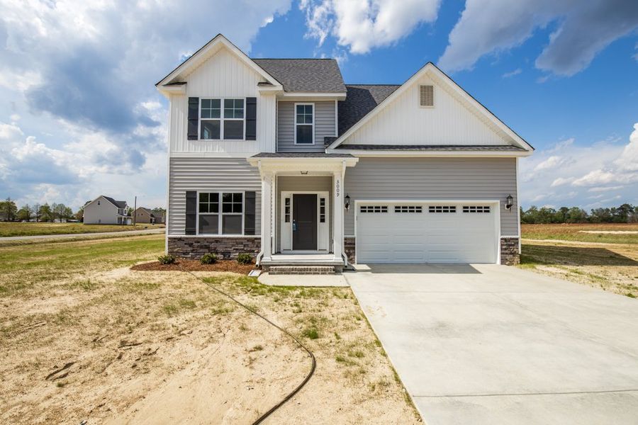 Representative exterior photo of a completed home built from the Ryder by Bill Clark Homes in Arbor Hills South II, Greenville, NC (Image 21). Representative exterior photo of a completed home built from the Ryder by Bill Clark Homes in Arbor Hills South II, Greenville, NC (Image 21).
