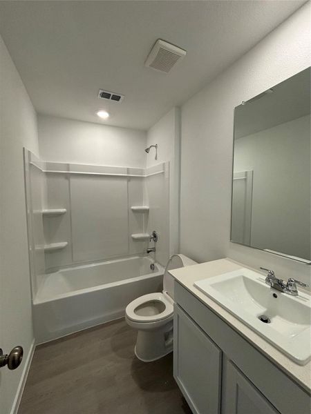 Furnished interior view inside a new home in Avalon Ridge: Cottage, Conroe (Image 6).