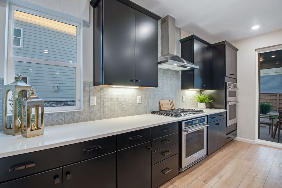 Furnished interior view inside a new home in Reunion, Commerce City (Image 10).
