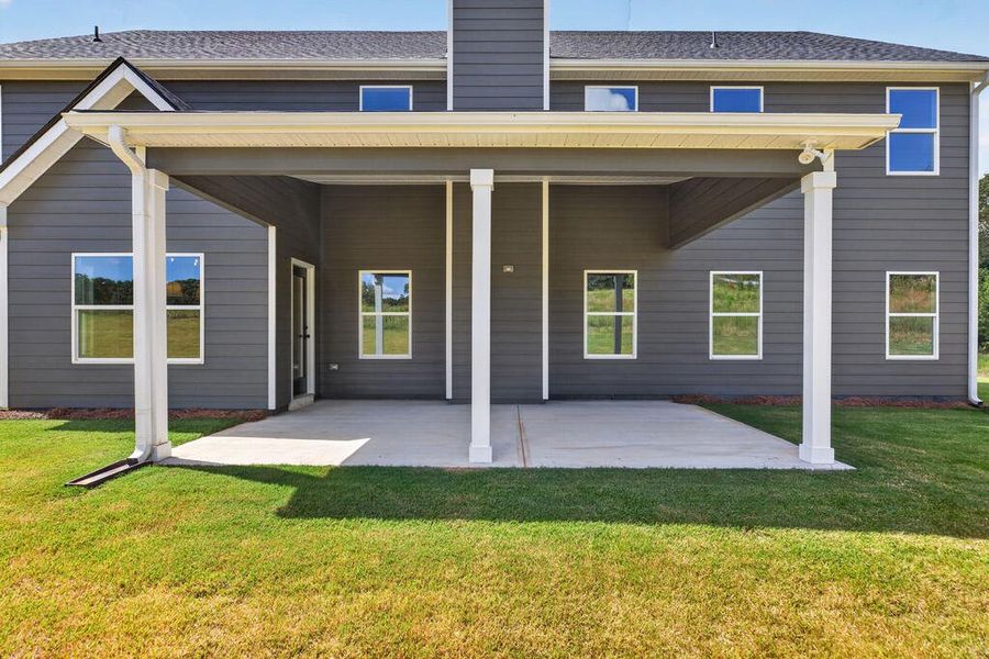 Exterior details and patio area of a home in Blackwelder Bluff, Bowdon (Image 32).