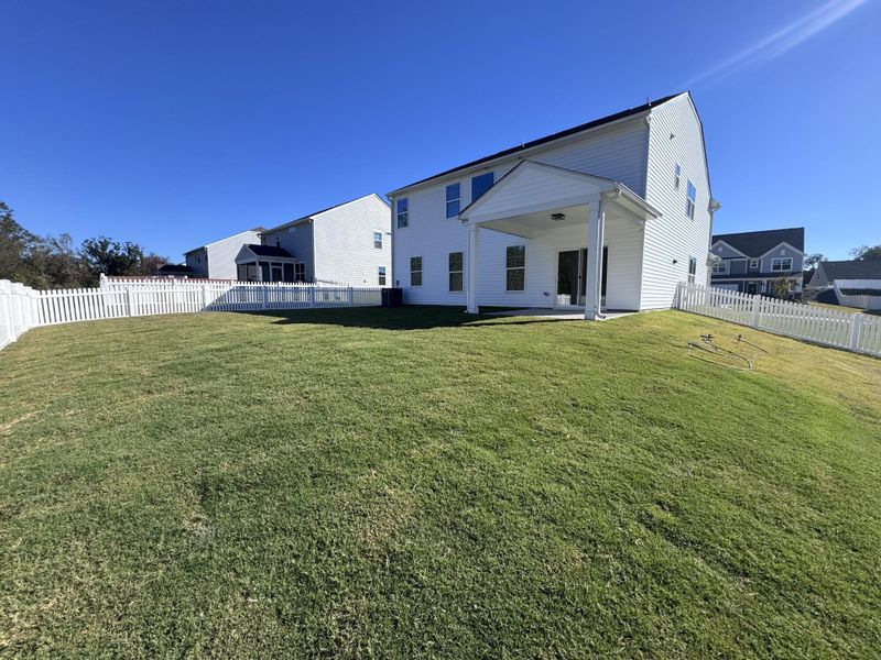 Exterior details and patio area of a home in Cottages at Piper Village, Trinity (Image 3). Exterior details and patio area of a home in Cottages at Piper Village, Trinity (Image 3).