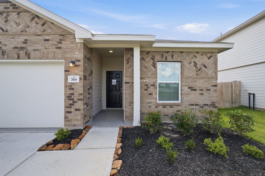 Exterior details and patio area of a home in Trails at Woodhaven Lakes, La Marque (Image 20). Exterior details and patio area of a home in Trails at Woodhaven Lakes, La Marque (Image 20).