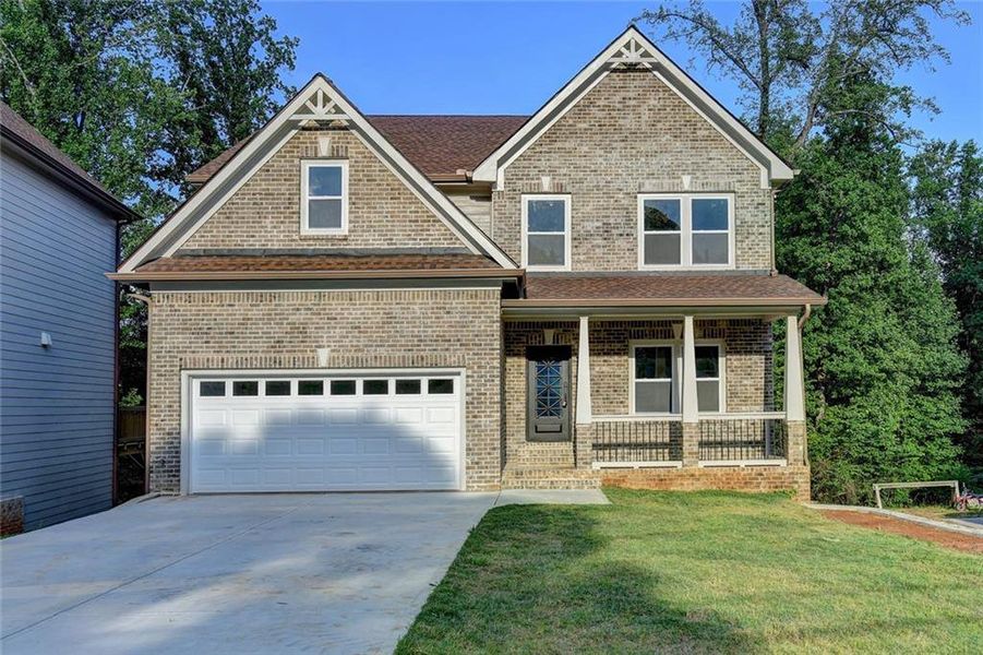 Front exterior of a new home in , Lilburn, GA, highlighting curb appeal (Image 2).