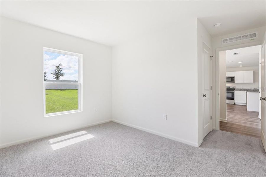 Spacious, unfurnished interior of a new home in The Grove at Scenic Terrace, Lake Hamilton (Image 40).