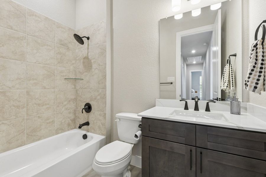 Representative furnished interior of a home built from the The Quartz by Lillian Custom Homes in Peaks at Lone Elm, Waxahachie (Image 32). Representative furnished interior of a home built from the The Quartz by Lillian Custom Homes in Peaks at Lone Elm, Waxahachie (Image 32).