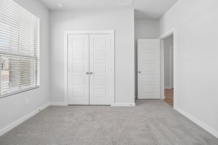 Bedroom in the Masters home plan by Trophy Signature Homes