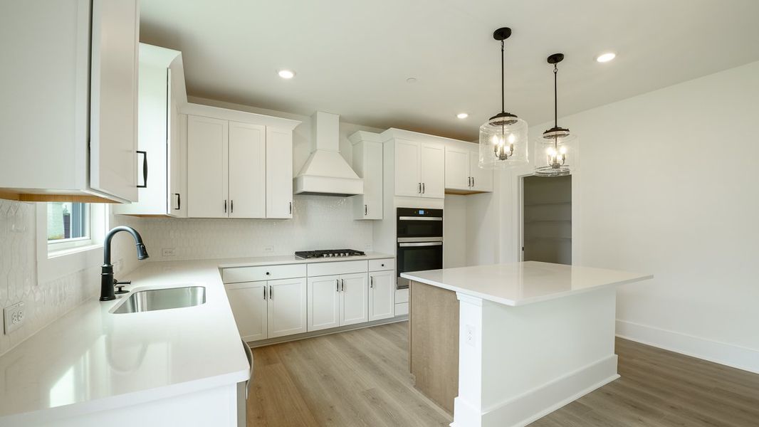 Representative furnished interior of a home built from the Hanover by D.R. Horton in The Village at Sandy Plains, Marietta (Image 5).