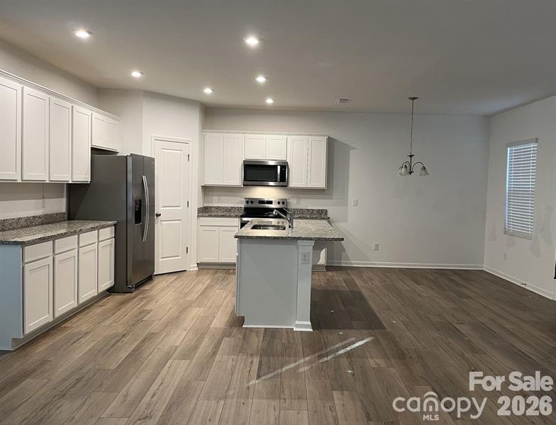 Furnished interior view inside a new home in , Charlotte (Image 6).