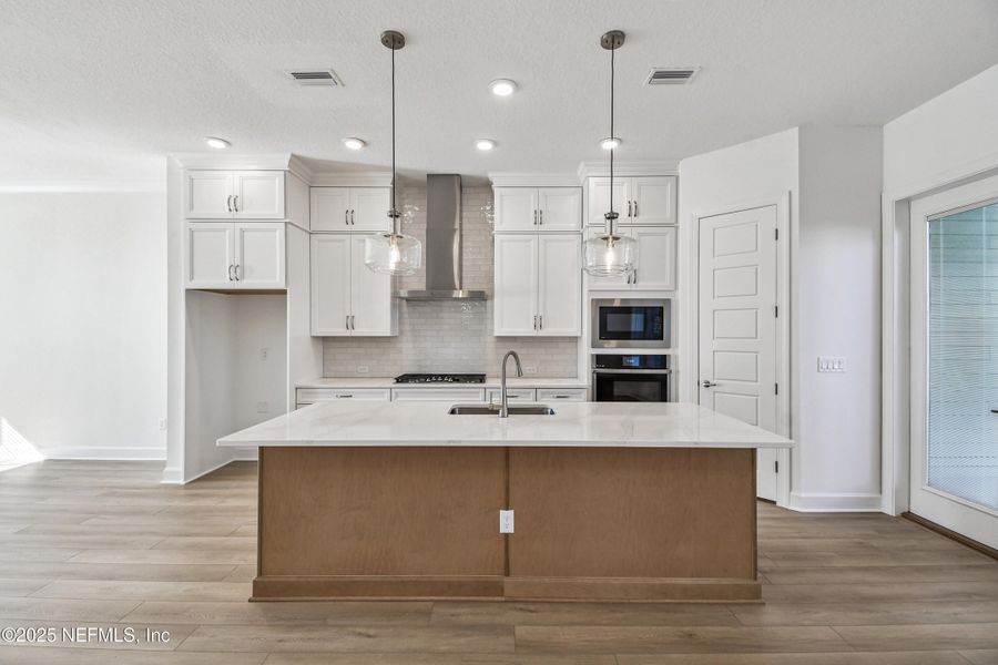 Furnished interior view inside a new home in Seven Pines 24' Rear Entry Townhomes, Jacksonville (Image 6).