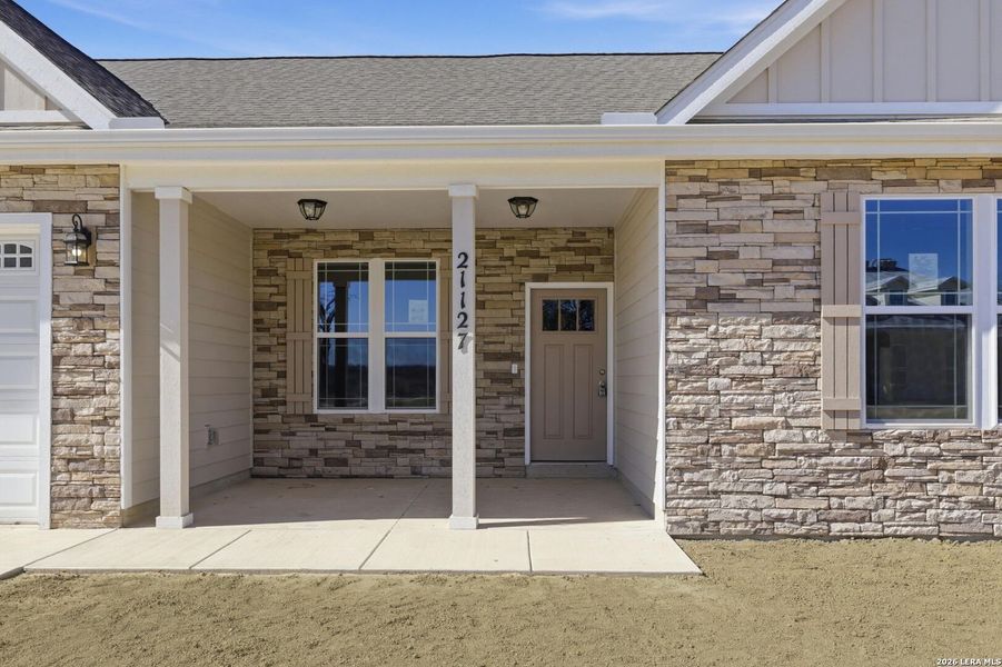 Exterior details and patio area of a home in Lonesome Dove, San Antonio (Image 3).