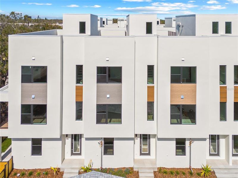 Front exterior of a new home in Alante, St. Petersburg, FL, highlighting curb appeal (Image 1). Front exterior of a new home in Alante, St. Petersburg, FL, highlighting curb appeal (Image 1).