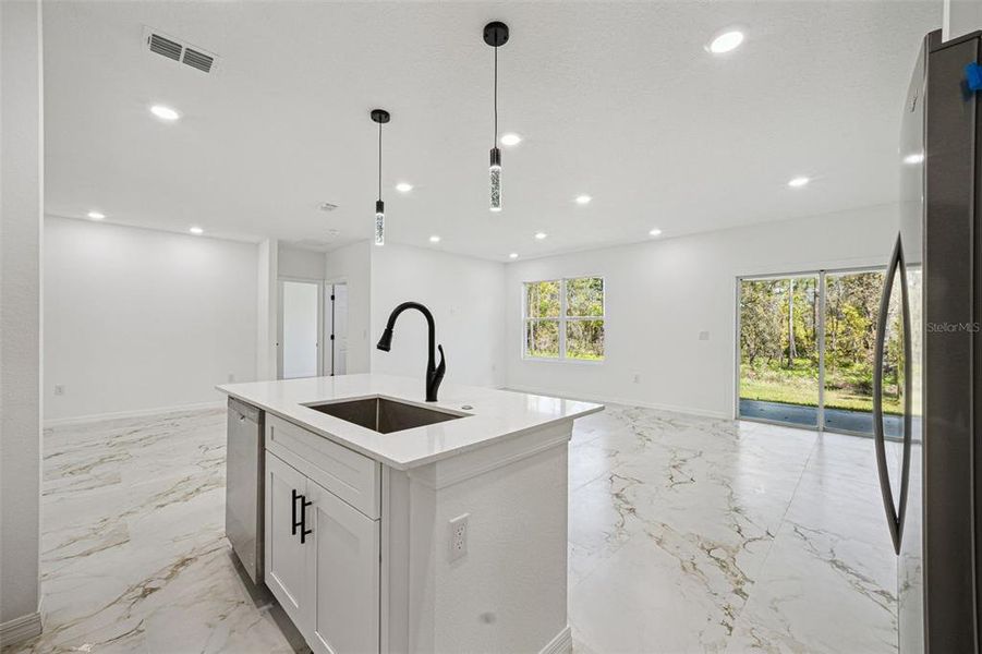 Furnished interior view inside a new home in , Citrus Springs (Image 13).