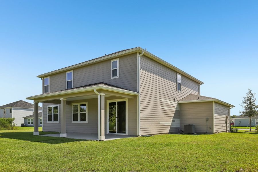 Exterior details and patio area of a home in Hawkes Meadow, Jacksonville (Image 4).