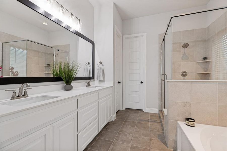 Dual vanity with undermount sinks and brushed nickel fixtures