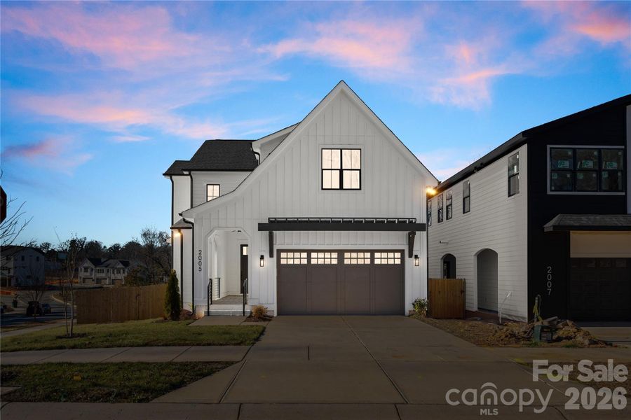 Front exterior of a new home in , Charlotte, NC, highlighting curb appeal (Image 1). Front exterior of a new home in , Charlotte, NC, highlighting curb appeal (Image 1).