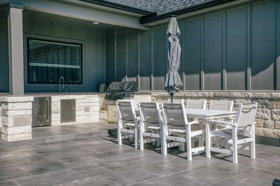 Exterior details and patio area of a home in , Chappell Hill (Image 4).
