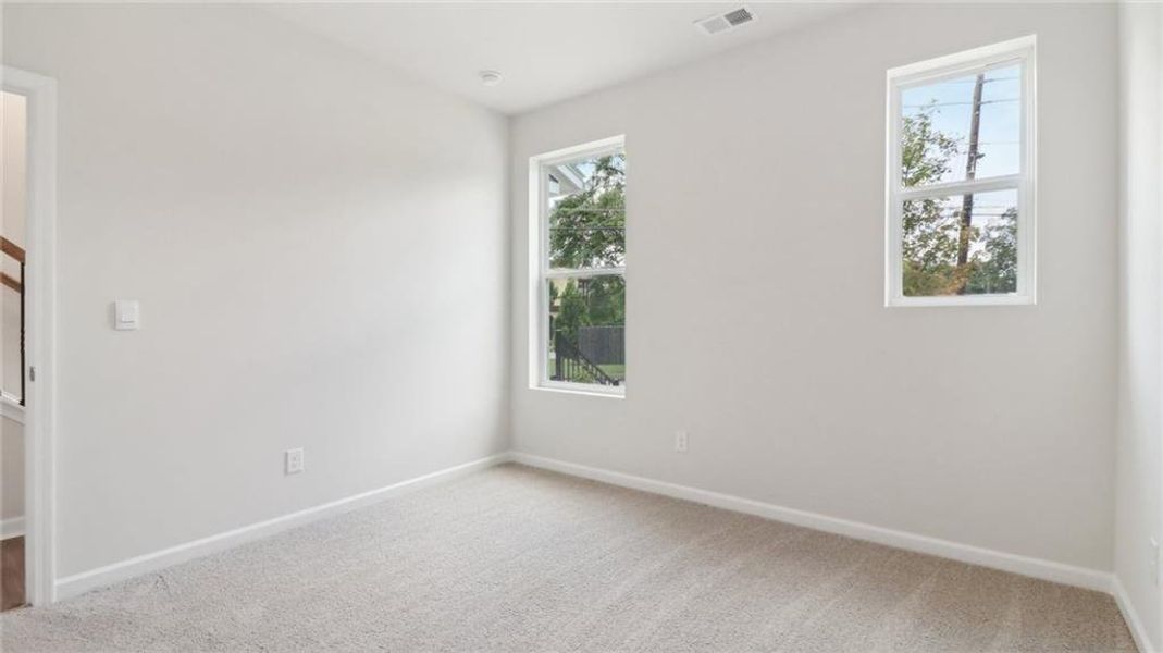 Spacious, unfurnished interior of a new home in Townes at Asbury, Hapeville (Image 23).