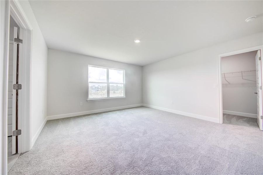 Spacious, unfurnished interior of a new home in Aviary at Rutland Ranch, Parrish (Image 17).