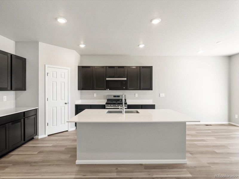 Furnished interior view inside a new home in , Commerce City (Image 10).