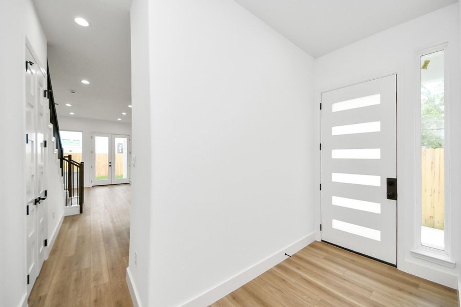 Front door entry w/ natural light. Front door entry w/ natural light.