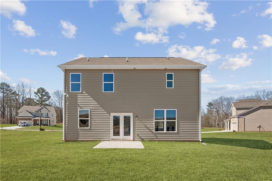 Exterior details and patio area of a home in Highland Park, Stonecrest (Image 15).