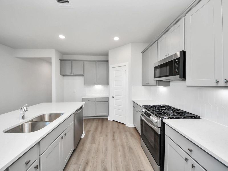 Furnished interior view inside a new home in Emberly, Beasley (Image 9).
