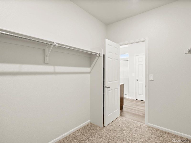 Spacious, unfurnished interior of a new home in Poudre Heights: The Lakes Collection, Windsor (Image 17).