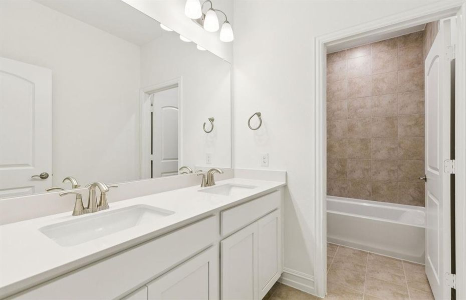 Spacious secondary bathroom with double vanity Spacious secondary bathroom with double vanity