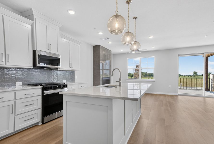 Furnished interior view inside a new home in The Tribute, The Colony (Image 6).