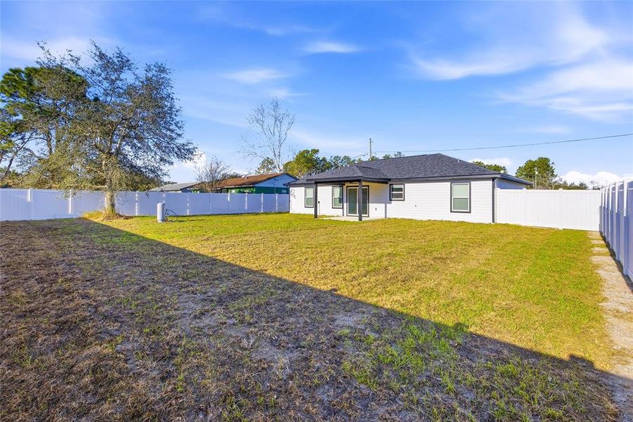 Exterior details and patio area of a home in , Ocala (Image 24).