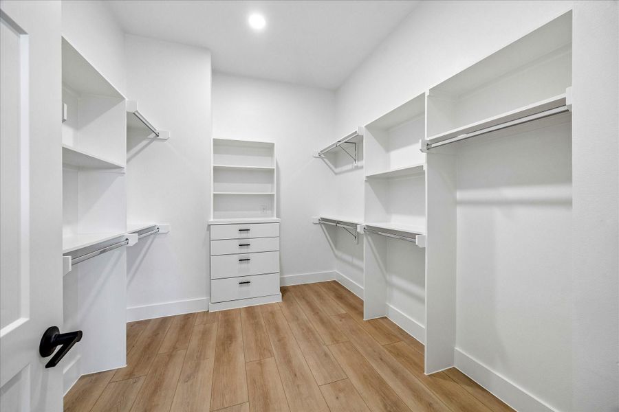 Custom built shelving and thoughtfully designed storage maximize both beauty and everyday functionality.