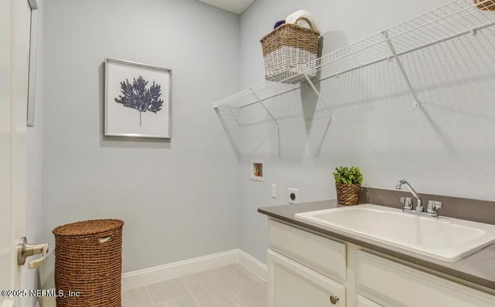 Furnished interior view inside a new home in Silver Falls Single Family at SilverLeaf: Silver Falls 60s at SilverLeaf, St. Augustine (Image 14).